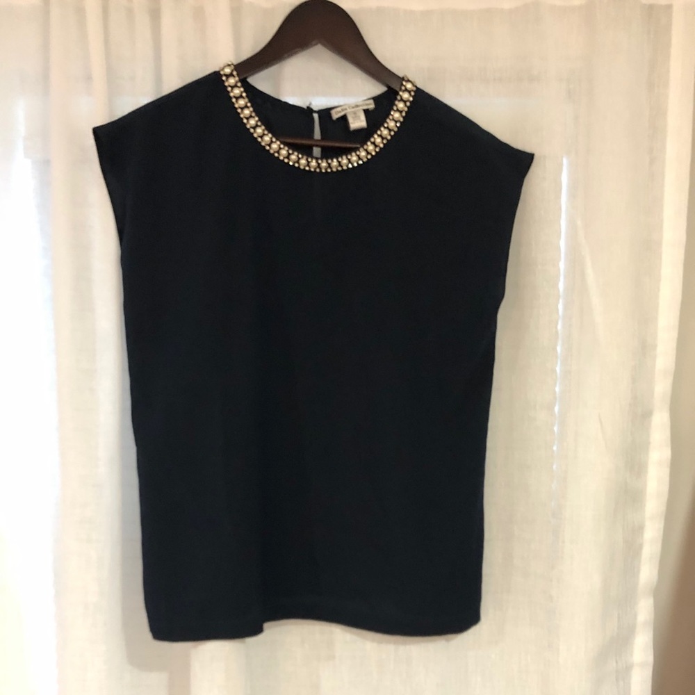 Navy top with pearl/diamond collar